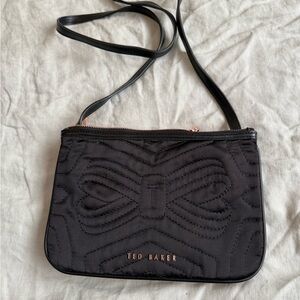 Ted Baker Black Quilted crossbody with Rose Gold metal lettering and zippers.